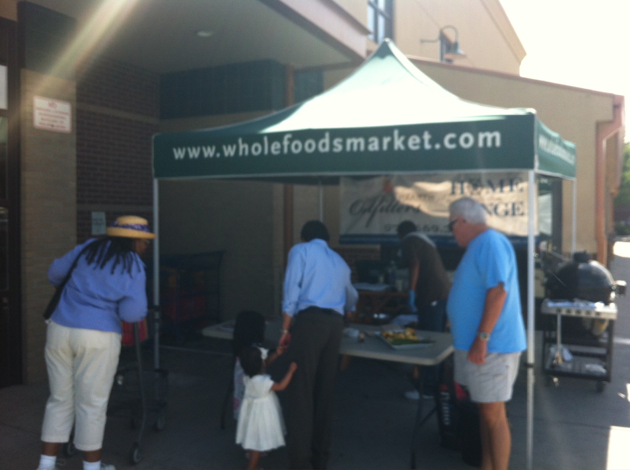 booth outside whole foods